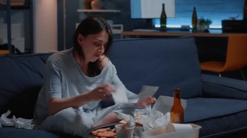 Hysterical Woman Ripping Paper Letter with Banking Termination Notification