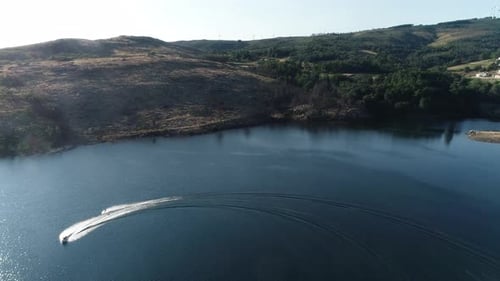 Scenic Lake With Speedboat From Aerial View