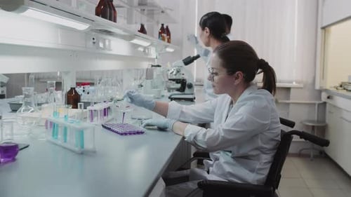 Scientists Conducting Research in a Bright Laboratory