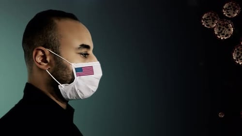 Man Wearing American Flag Mask with Pandemic Virus Particles