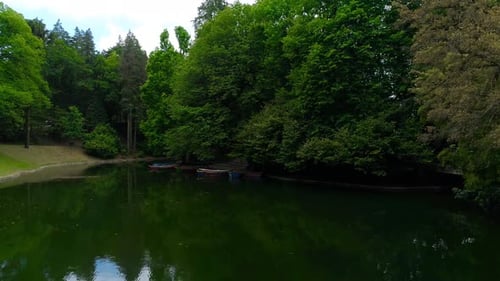 Flying Over Calm Summer Lake