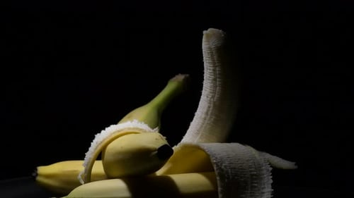 Ripe Bananas Lit in Dark Studio
