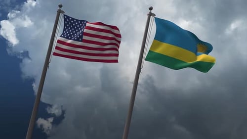 United States and Rwanda Flags Waving in Cloudy Sky