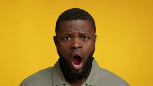 Man With Open Mouth Making a Surprised Expression