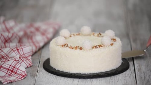Delicious Coconut Mousse Cake Decorated with Candy and Almond