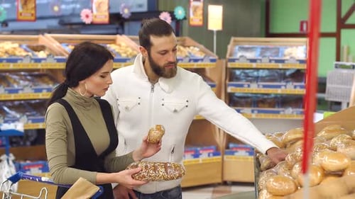 Family in Supermarket, While Choosing Fresh Bread in Bakery Department