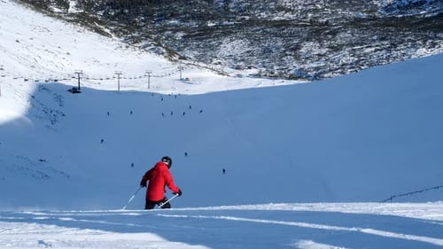 Skiers are Skiing on the Slopes in the Mountains Mountain Downhill 60p