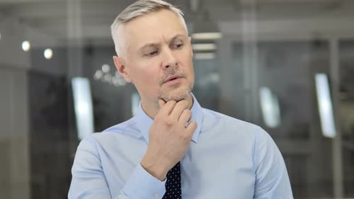 Thinking Grey Hair Businessman in Office, Brainstorming