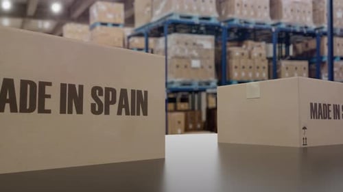 Boxes with MADE IN SPAIN Text on Conveyor