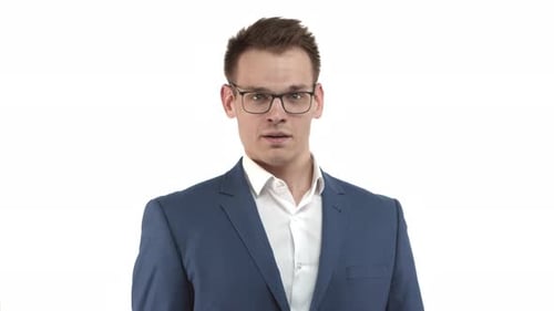 Man in Suit Points Finger Sternly at Camera