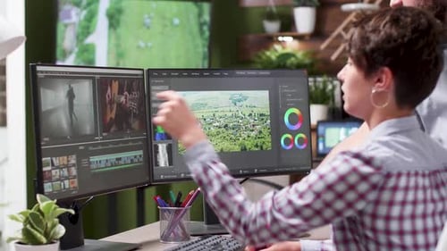 Freelancer Working with an Editor on Some Footage
