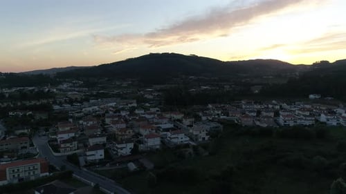 Aerial View of Residential Houses in Suburban Rural Area at Sunset