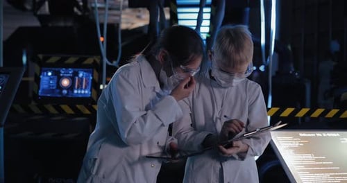 Laboratory Assistants Record the Experimental Data Bring in the Tablet