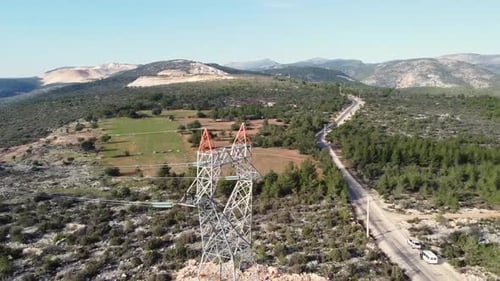 Aerial View of Transmission Tower in Rural Landscape