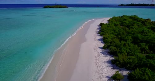Wide drone abstract view of a white paradise beach and turquoise sea background in 4K