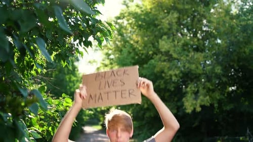 Young Adult Holding Black Lives Matter Sign
