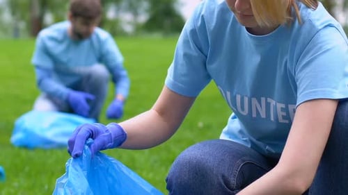 Female Eco-Activist Collecting Rubbish in Park, Nature Protection Love to Nature