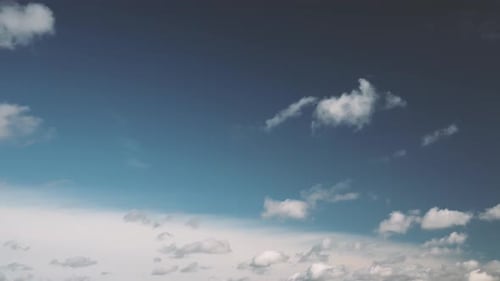 Cloudy Sky With Fluffy Clouds