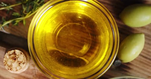 Olive Oil with Air Bubbles. Macro Background. The Texture of Olive Oil