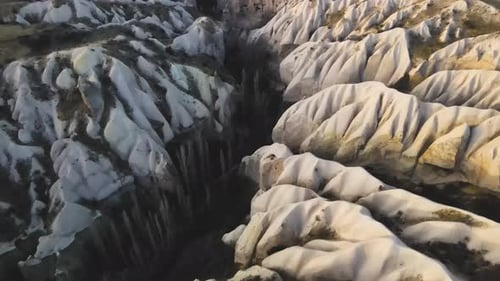 Cappadocia Aerial Drone or Balloon View to Red and Rose Valley Rock Formation Ancient Cave Churches