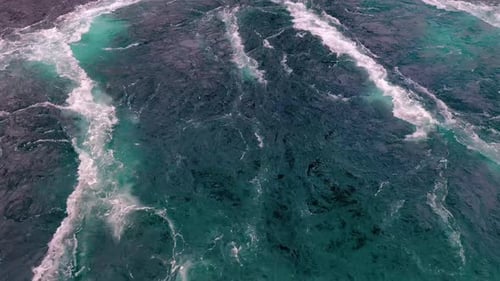 Waves of Water of the River and the Sea Meet Each Other