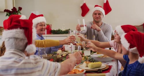 Family Christmas Celebration With Glasses Toast