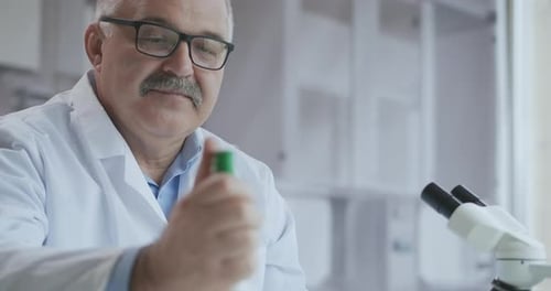 Microbiology Laboratory: Scientist Works with Various Bacteria. Concept of Pharmaceutical Research