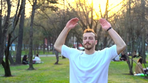 Man doing sports by jumping in the park.