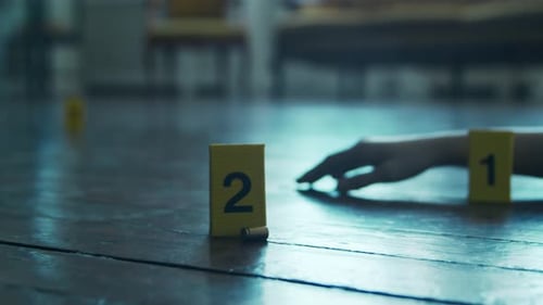 Crime Scene Evidence Marker on Wooden Floor