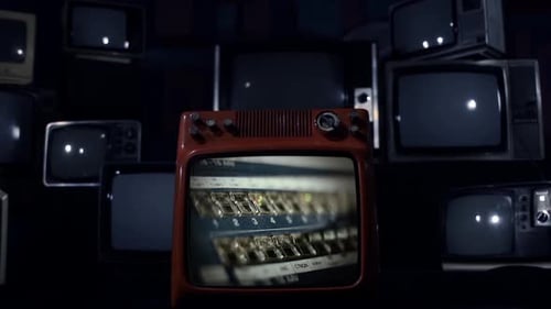 Vintage Televisions Displaying Static and Shattering Screen