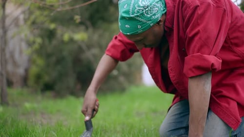 Person Gardening Outside in Rural Environment