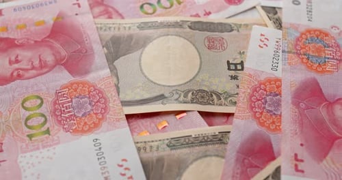 Close Up of Chinese Yuan and Japanese Yen