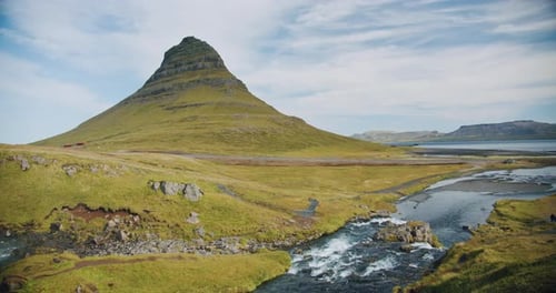 Green Mountain Peak and Kirkjufellsfoss Fall is Popular Attractions at Morning at Iceland Summertime
