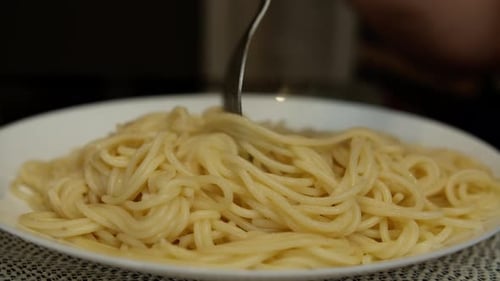 Delicious Spaghetti Twirled on a Fork Close-Up