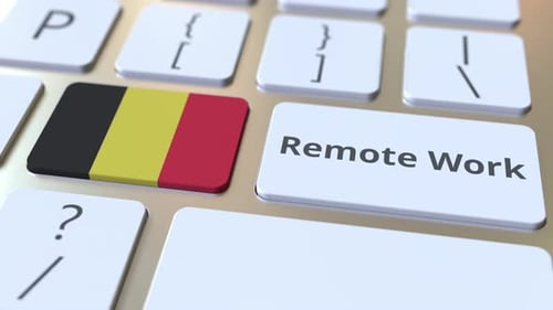 Texte et drapeau de la Belgique sur clavier d'ordinateur relatifs au travail à distance