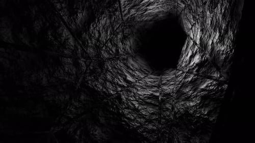 Underground tunnel to center of the earth. Journey into depths of cliff. Drilling tunnel in rocky