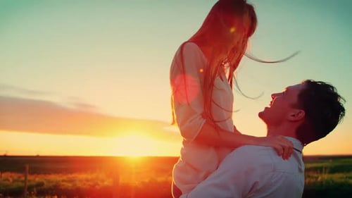 Romantic couple having fun in field