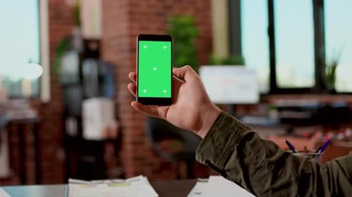 Phone Green Screen Held in Office Setting