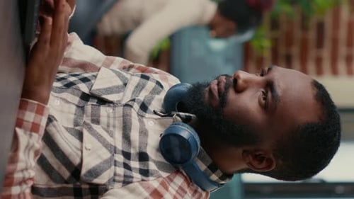 Man Working on Laptop in Modern Office Setting