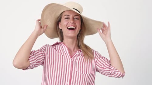Woman Laughing Wearing Fashionable Straw Sunhat