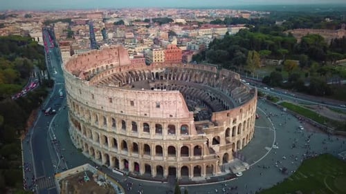 Aerial Shot of Iconic Ancient Arena of Colosseum in Rome Italy | Also Known As Flavian Amphitheatre