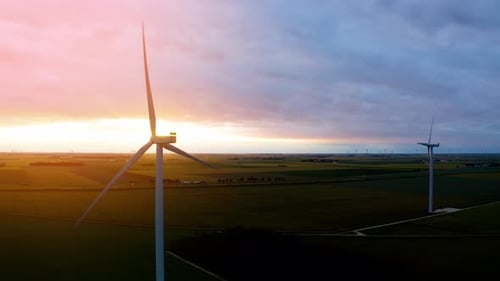 Solar power plant and Windmills aerial view.