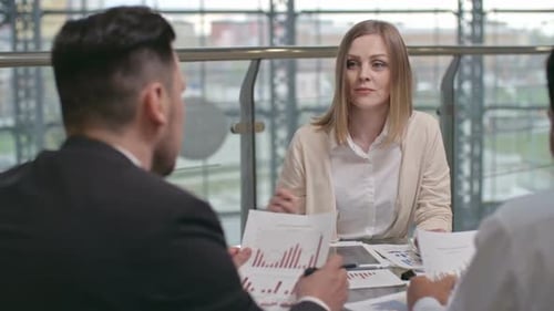 Focused Business Team Discussing Data