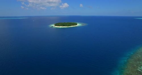 Aerial drone view of scenic tropical islands in the Maldives.