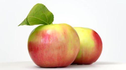 Fresh Apple Rotating on White Background