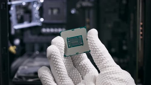 The Hand Holds the Central Processing Unit