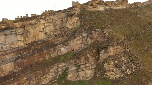 Ancient Towers and Ruins of the Abandoned Village on a Cliff