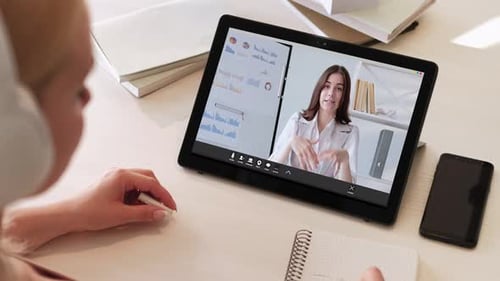 Woman Attends Online Meeting At Home Office