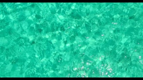 Aerial top down seascape of exotic island beach holiday by blue sea and white sand background of a d