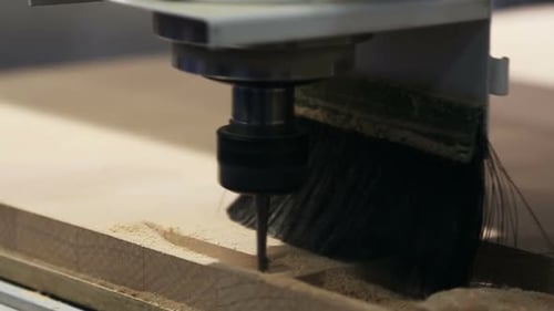 Computer Numerical Control Router Milling a Piece of Wood